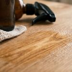 Ultra close-up macro of natural oak wood surface buffed to a satin finish with homemade dusting spray